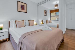 Llit o llits en una habitació de Mansion House Flat by MySquare