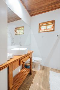 a bathroom with a sink and a toilet at Pousada Fruta Pão in Barra Grande +146 photos