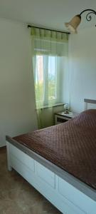 Krevet ili kreveti u jedinici u objektu Apartment Valentina