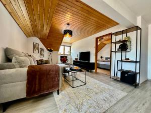 Posezení v ubytování Ferienwohnung Olymp (2,5 Zimmer)