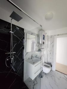 Ένα μπάνιο στο Complex Rezidential Vamaland +63 φωτογραφίες