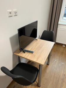 TV a/nebo společenská místnost v ubytování Firstsleep Ebersberg