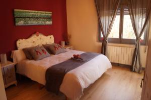 Ένα ή περισσότερα κρεβάτια σε δωμάτιο στο Apartamento con encanto L'Estany 1