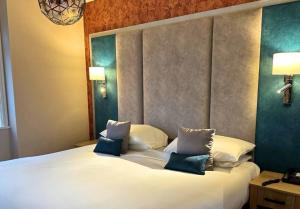 Voodi või voodid majutusasutuse Caerwylan Hotel toas