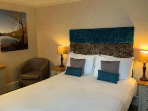 Voodi või voodid majutusasutuse Caerwylan Hotel toas