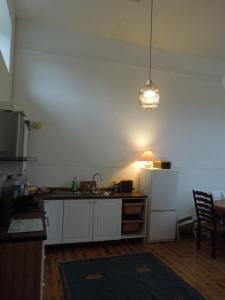 a kitchen with a sink and a counter top at Durrus in Durrus +30 photos