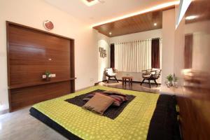 Ένα ή περισσότερα κρεβάτια σε δωμάτιο στο 5 Star residential's for Festivity - Madhapur +6 φωτογραφίες