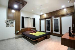 Ένα ή περισσότερα κρεβάτια σε δωμάτιο στο 5 Star residential's for Festivity - Madhapur