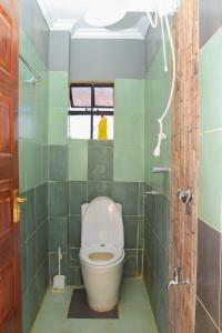 Koupelna v ubytování Tamwe ltd Airbnb &studios