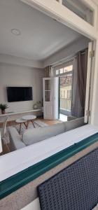 TV a/nebo společenská místnost v ubytování Machico Heart Suites
