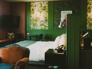 Rúm í herbergi á Hotel Eco Boutique Bidasoa
