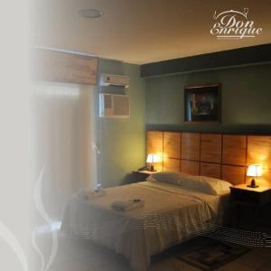 Een bed of bedden in een kamer bij Hotel Don Enrique