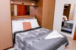 Un ou plusieurs lits dans un hébergement de l'établissement Apartamento Completo - LOFT FELAU