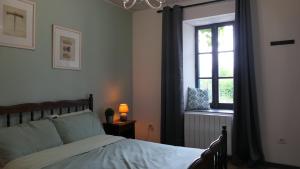 Le Moulin du Clapier La Banette客房内的一张或多张床位