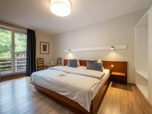 Letto o letti in una camera di Hotel Heintz