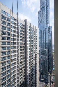 a view of some tall buildings in a city at Vinhome Landmark 81 Suites in Ho Chi Minh City
