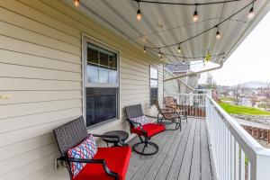 a porch with chairs and lights on a house at Palouse View Villa in Moscow