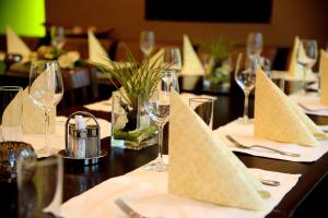 Reštaurácia alebo iné gastronomické zariadenie v ubytovaní Hotel & Restaurant Graf