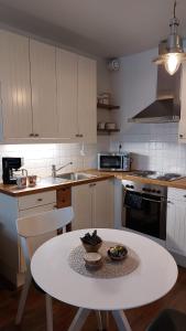 Kuchyň nebo kuchyňský kout v ubytování Scandinavian Home