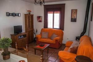 TV a/nebo společenská místnost v ubytování Casa Alba