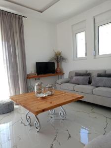 TV a/nebo společenská místnost v ubytování Blue Sky Villa