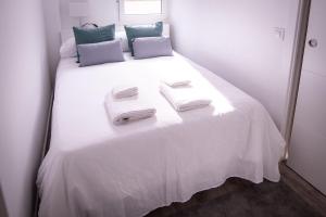 Voodi või voodid majutusasutuse Apartamento Gran Via toas