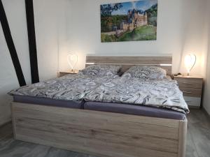 Ένα ή περισσότερα κρεβάτια σε δωμάτιο στο Haus Moselwind