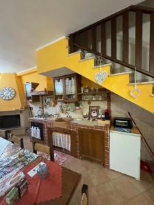 Kuchyň nebo kuchyňský kout v ubytování Taverna relais + 11 fotografií