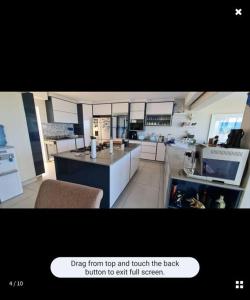 a screenshot of a kitchen with a screenshot at Beach House in Glenashley in Durban