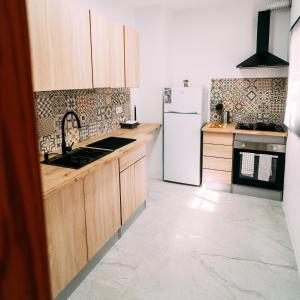 Η κουζίνα ή μικρή κουζίνα στο LOS VEINTE BALCONES +5 φωτογραφίες