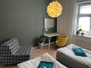 Posteľ alebo postele v izbe v ubytovaní Pension Skylark