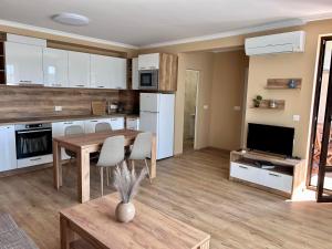 Kuchyň nebo kuchyňský kout v ubytování Апартаменти Bella Deluxe