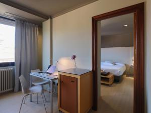 Posteľ alebo postele v izbe v ubytovaní Hotel Almirante
