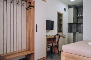 Μια τηλεόραση ή/και κέντρο ψυχαγωγίας στο Apartments On The Top