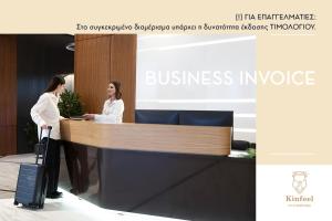 two women standing at a reception desk with a suitcase at Brand new studios IPM1-2-3-4 in Larisa