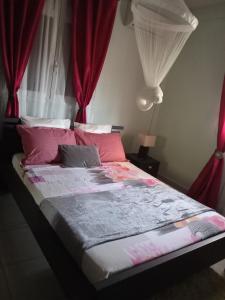 Postel nebo postele na pokoji v ubytování Bas de villa louna