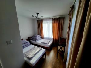 Ένα ή περισσότερα κρεβάτια σε δωμάτιο στο Mościce Dolne 69