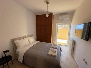 Postel nebo postele na pokoji v ubytování Eros Apartment Superb View