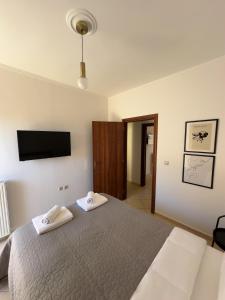 Postel nebo postele na pokoji v ubytování Eros Apartment Superb View