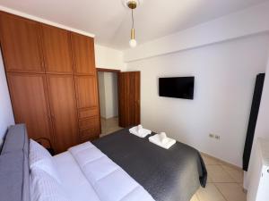 Postel nebo postele na pokoji v ubytování Eros Apartment Superb View