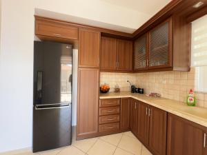 Kuchyň nebo kuchyňský kout v ubytování Eros Apartment Superb View