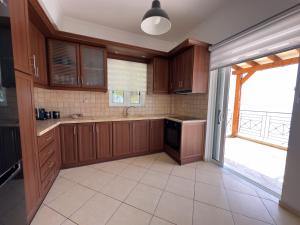 Kuchyň nebo kuchyňský kout v ubytování Eros Apartment Superb View
