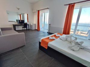 Postel nebo postele na pokoji v ubytování Hotel Cosmos