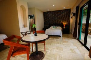 Letto o letti in una camera di Hotel Villas Tiburon Adults Only