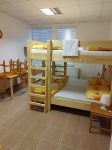 Postel nebo postele na pokoji v ubytování Penzion U Lipna