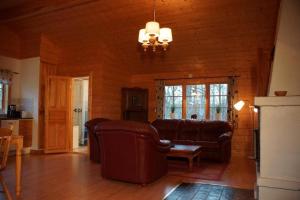 Fotografie z fotogalerie ubytování Charmantes Holzhaus mit Nebengebäude v destinaci Sexdrega