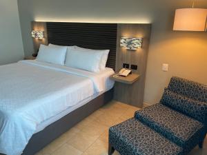 Postel nebo postele na pokoji v ubytování Holiday Inn Express Mérida by IHG