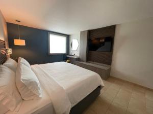 Postel nebo postele na pokoji v ubytování Holiday Inn Express Mérida by IHG