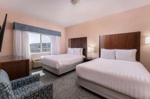 Ένα ή περισσότερα κρεβάτια σε δωμάτιο στο Prestige Cranbrook Hotel, BW Premier Collection