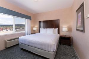 Ένα ή περισσότερα κρεβάτια σε δωμάτιο στο Prestige Cranbrook Hotel, BW Premier Collection